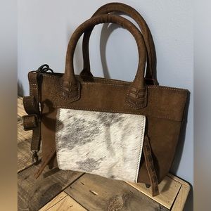 STS Ranchwear genuine leather and cowhide conceal carry purse.